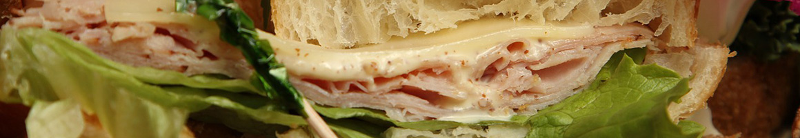 Eating Sandwich at Lighthouse Espresso restaurant in Missoula, MT.